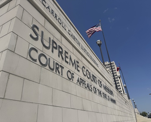 The American flag waves outside the Mississippi Supreme Court in Jackson, Miss., April 17, 2025. (AP Photo/Sophie Bates)