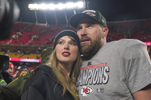 FILE - Kansas City Chiefs tight end Travis Kelce, right, appears with singer Taylor Swift after the Chiefs victory over the Buffalo Bills in the AFC Championship game in Kansas City, Mo., on Jan. 26, 2025. (AP Photo/Charlie Riedel, File)