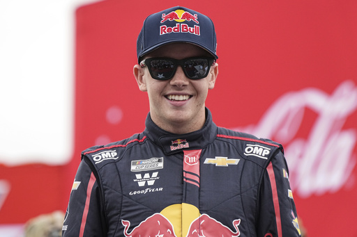 FILE - Connor Zilisch smiles prior to a NASCAR Cup Series auto race at Charlotte Motor Speedway, May 25, 2025, in Concord, N.C. (AP Photo/Matt Kelley, file)