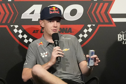 NASCAR driver Connor Zilisch answers questions during an auto racing news conference at Daytona International Speedway, Saturday, Aug. 23, 2025, in Daytona Beach, Fla. (AP Photo/John Raoux)
