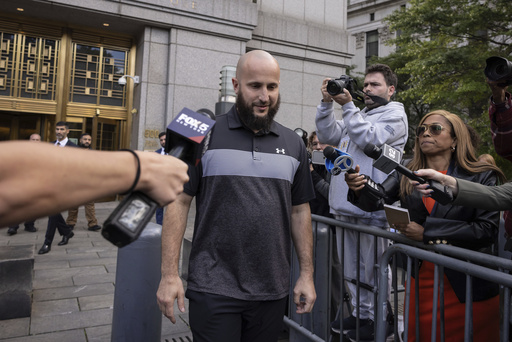 FILE - Mohamed Bahi, New York City Mayor's liaison to the Muslim community exits Manhattan Federal Court, Oct. 8, 2024, in New York. (AP Photo/Yuki Iwamura, File)