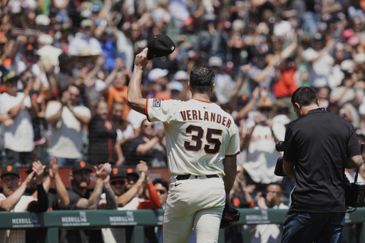 San Francisco Giants pitcher Justin Verlander (35) gestures to the crowd after getting his 3,500th career strikeout in the first inning of a baseball game against the Washington Nationals, Sunday, Aug. 10, 2025, in San Francisco. (AP Photo/Godofredo A. Vásquez)