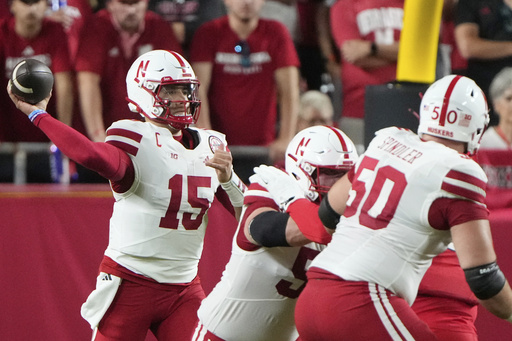 Nebraska quarterback Dylan Raiola (15) passes during the first half of an NCAA college football game against Cincinnati, Thursday, Aug. 28, 2025, at Arrowhead Stadium in Kansas City, Mo. (AP Photo/Charlie Riedel)