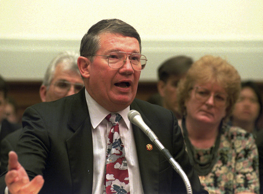 FILE - Rep. Randy "Duke" Cunningham R-Calif, gestures while testifying on Capitol Hill in Washington, July 12, 1995. (AP photo/Dennis Cook, File)