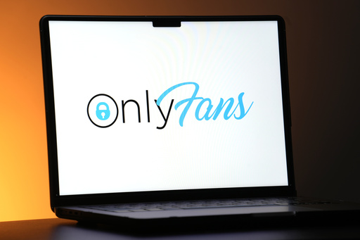 FILE - The OnlyFans logo is displayed on a computer monitor in this posed photo, Dec. 7, 2023, in St. Louis. (AP Photo/Jeff Roberson, File)