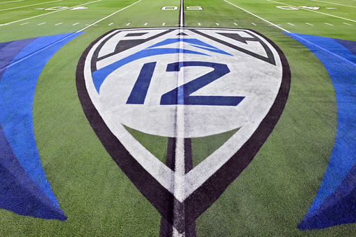 FILE - The logo of the Pac 12 is seen on the field before the Pac-12 championship NCAA college football game between Washington and Oregon, Dec. 1, 2023, in Las Vegas. (AP Photo/David Becker, file)
