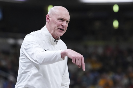 FILE- Indiana Pacers head coach Rick Carlisle calls out from the bench against the Cleveland Cavaliers in the first half of Game 4 in the Eastern Conference semifinals of the NBA basketball playoffs in Indianapolis, Sunday, May 11, 2025. (AP Photo/Michael Conroy, File)