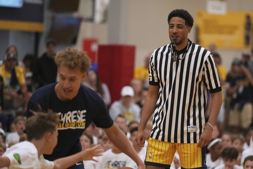 Indiana Pacers' Tyrese Haliburton watches a scrimmage during his basketball camp at the Indiana Pacers Athletic Center, Saturday, Aug. 23, 2025, in Westfield, Ind. (AP Photo/Darron Cummings)