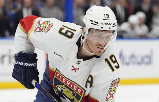 FILE - Florida Panthers left wing Matthew Tkachuk (19) against the Tampa Bay Lightning during the first period in Game 5 of an NHL hockey Stanley Cup first-round playoff series, April 30, 2025, in Tampa, Fla. (AP Photo/Chris O'Meara, File)