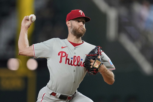 Philadelphia Phillies starting pitcher Zack Wheeler throws to the Texas Rangers in the second inning of a baseball game Sunday, Aug. 10, 2025, in Arlington, Texas. (AP Photo/Tony Gutierrez)