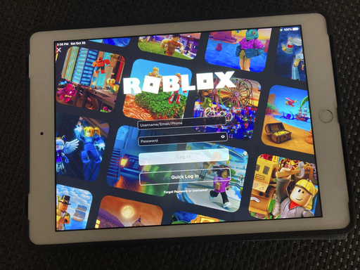 FILE - The gaming platform Roblox is displayed on a tablet, Oct. 30, 2021, in New York. (AP Photo/Leon Keith, File)