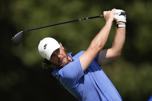 Tommy Fleetwood, of England, watches his tee shot on the seventh hole during the second round of the St. Jude Championship golf tournament Friday, Aug. 8, 2025, in Memphis, Tenn. (AP Photo/George Walker IV)