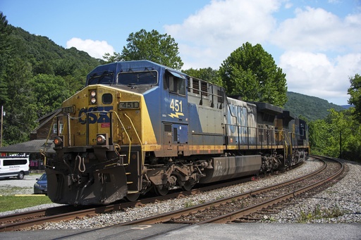 A CSX freight pulls through Ohiopyle, Pa., on Tuesday, Aug. 19, 2025. (AP Photo/Gene J. Puskar)