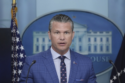 Secretary of Defense Pete Hegseth speaks during a press briefing with President Donald Trump in the James Brady Press Briefing Room at the White House, Monday, Aug. 11, 2025, in Washington. (AP Photo/Alex Brandon)