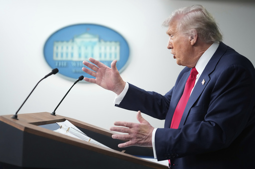 President Donald Trump speaks with reporters in the James Brady Press Briefing Room at the White House, Monday, Aug. 11, 2025, in Washington. (AP Photo/Mark Schiefelbein)