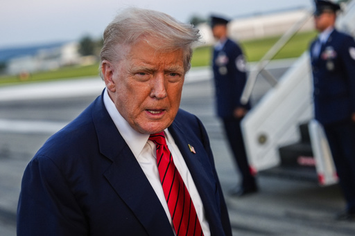 President Donald Trump speaks with reporters before boarding Air Force One at Lehigh Valley International Airport, Sunday, Aug. 3, 2025, in Allentown, Pa. (AP Photo/Julia Demaree Nikhinson)