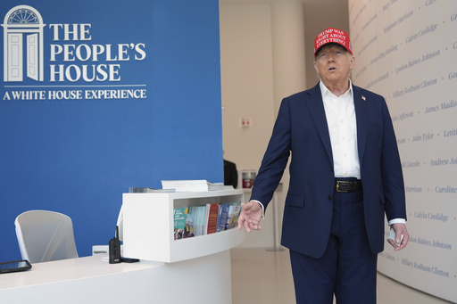 President Donald Trump speaks with reporters at The People's House museum. Friday, Aug. 22, 2025, in Washington. (AP Photo/Evan Vucci)