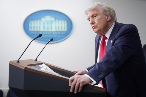 President Donald Trump listens to a question from a reporter in the James Brady Press Briefing Room at the White House, Monday, Aug. 11, 2025, in Washington. (AP Photo/Mark Schiefelbein)