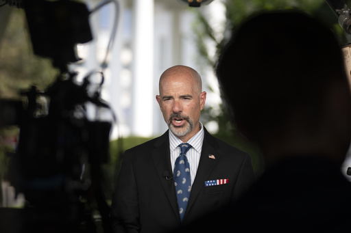 Drug Enforcement Agency Administrator Terrance Cole speaks during a television interview outside the White House, Tuesday, Aug. 12, 2025, in Washington. (AP Photo/Mark Schiefelbein)