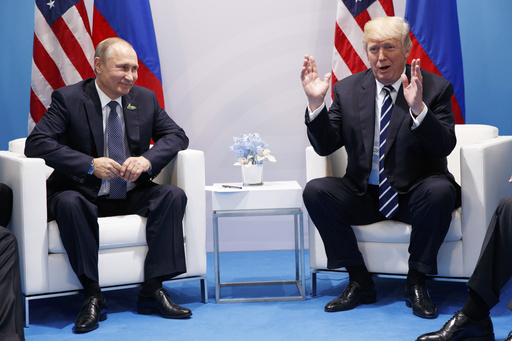FILE - President Donald Trump speaks during a meeting with Russian President Vladimir Putin at the G20 Summit, July 7, 2017, in Hamburg. (AP Photo/Evan Vucci)