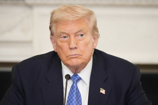 President Donald Trump participates in a trilateral signing ceremony with Armenian Prime Minister Nikol Pashinyan and Azerbaijan President Ilham Aliyev in the State Dining Room of the White House, Friday, Aug. 8, 2025, in Washington. (AP Photo/Mark Schiefelbein)