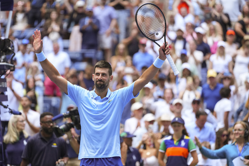 Novak Djokovic, of Serbia, reacts to the crowd after defeating Zachary Svajda, of the United States, during the second round of the U.S. Open tennis championships, Wednesday, Aug. 27, 2025, in New York. (AP Photo/Kirsty Wigglesworth)