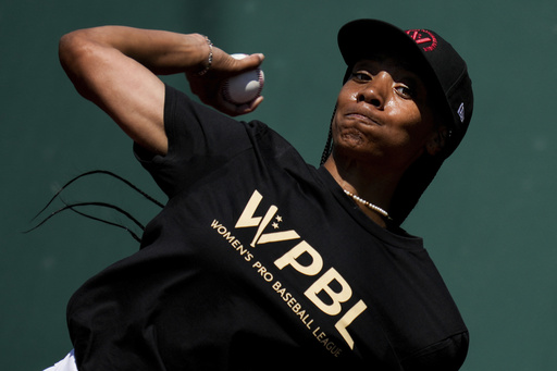 Mo'ne Davis throws during the first day of tryouts for the Women's Professional Baseball League, Friday, Aug 22, 2025, at the Washington Nationals Youth Baseball Academy in Washington. (AP Photo/Julia Demaree Nikhinson)