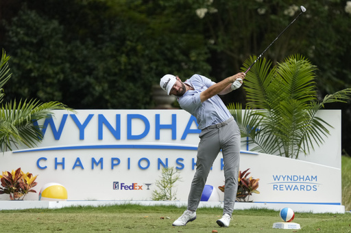 Cameron Young hits his tee shot on the ninth hole during the final round of the Wyndham Championship golf tournament in Greensboro, N.C., Sunday, Aug. 3, 2025. (AP Photo/Chuck Burton)