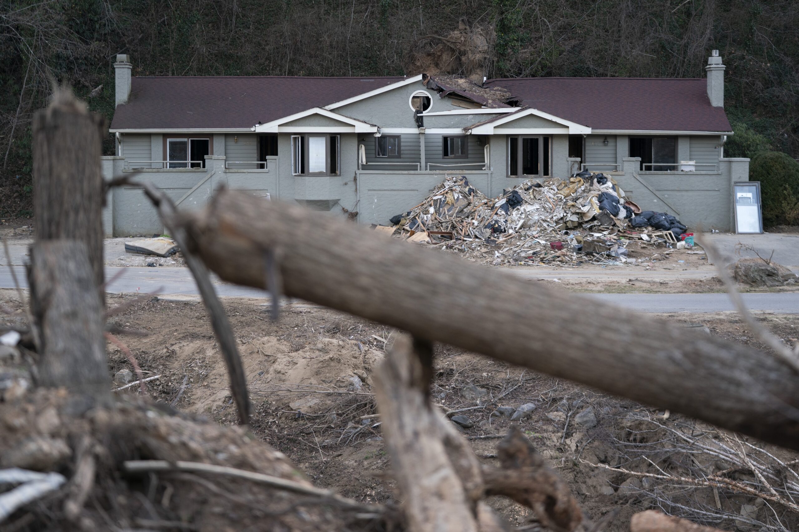 A storm-damaged apartment building in a landscape scarred by Hurricane Helene on March 24, 2025 near Swannanoa, North Carolina. (Photo by Sean Rayford/Getty Images)