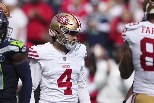 San Francisco 49ers place-kicker Jake Moody (4) reacts after making a field goal during the second half of an NFL football game against the Seattle Seahawks, Sunday, Sept. 7, 2025, in Seattle. (AP Photo/Lindsey Wasson)