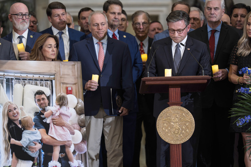 Speaker of the House Mike Johnson, R-La., right, joined by Majority Leader Steve Scalise, R-La., center left, leads a vigil to honor conservative activist Charlie Kirk who was shot and killed at an event in Utah last week, at the Capitol in Washington, Monday, Sept. 15, 2025. (AP Photo/J. Scott Applewhite)