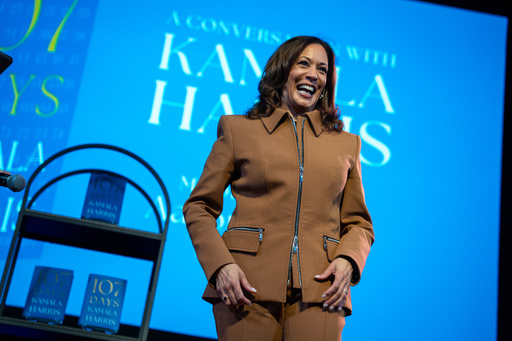 Former Vice President Kamala Harris exits the stage after the first stop of her book tour for her new book about her presidential campaign, "107 Days," at Town Hall in New York, Wednesday, Sept. 24, 2025. (AP Photo/Angelina Katsanis)