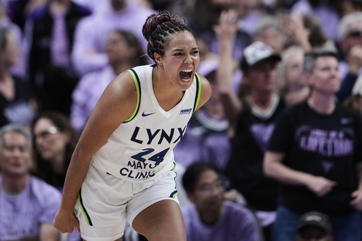 Minnesota Lynx forward Napheesa Collier celebrates after making a 3-point basket during the second half of Game 2 in the first round of the WNBA basketball playoffs against the Golden State Valkyries, Wednesday, Sept. 17, 2025, in San Jose, Calif. (AP Photo/Godofredo A. Vásquez)