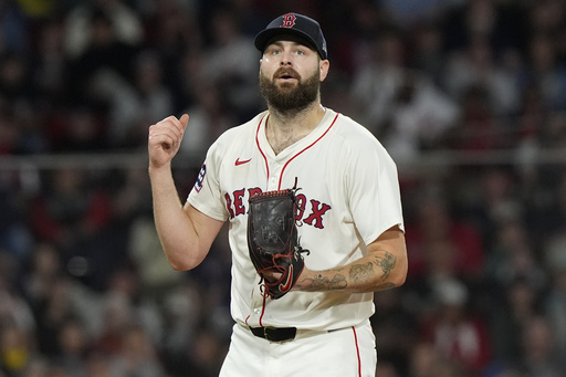 Boston Red Sox starting pitcher Lucas Giolito reacts after striking out Athletics Lawrence Butler with bases loaded in the third inning in of a baseball game against the Athletics, Wednesday, Sept. 17, 2025, in Boston. (AP Photo/Robert F. Bukaty)