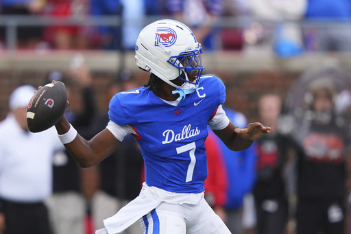 SMU quarterback Kevin Jennings throws a pass during the first half of an NCAA college football game against Baylor, Saturday, Sept. 6, 2025, in Dallas. (AP Photo/LM Otero)