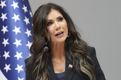 United States Secretary of Homeland Security Kristi Noem addresses the media during a visit to the Port of Antwerp in Antwerp, Belgium, Wednesday, Sept. 10, 2025. (AP Photo/Virginia Mayo)
