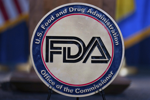 FILE - The Food and Drug Administration seal is seen at the Hubert Humphrey Building Auditorium in Washington, April 22, 2025. (AP Photo/Jose Luis Magana, File)
