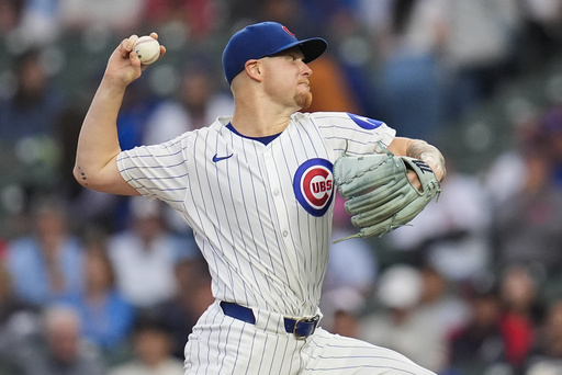 Chicago Cubs starting pitcher Cade Horton throws against the Atlanta Braves during the first inning of a baseball game Wednesday, Sept. 3, 2025, in Chicago. (AP Photo/Erin Hooley)