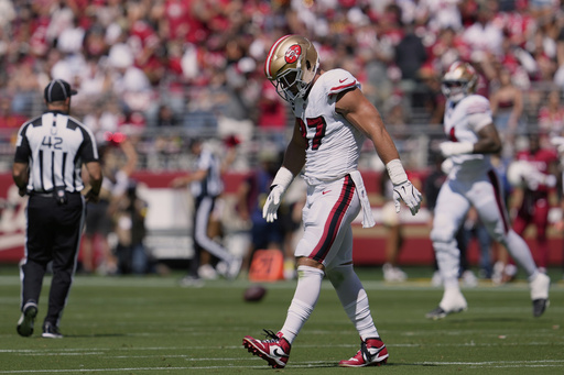 San Francisco 49ers defensive end Nick Bosa walks off the field during the first half of an NFL football game against the Arizona Cardinals, Sunday, Sept. 21, 2025, in Santa Clara, Calif. (AP Photo/Godofredo A. Vásquez)