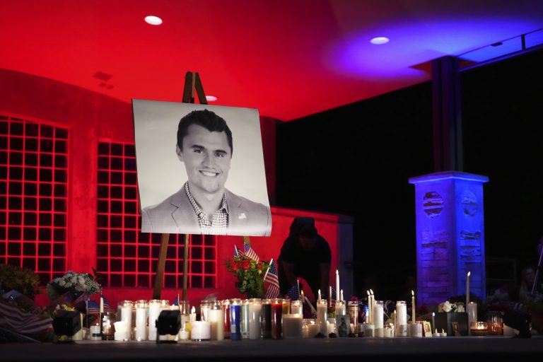A photo of Charlie Kirk, the CEO and co-founder of Turning Point USA who was shot and killed, stands at his vigil, Thursday, Sept. 11, 2025, in Orem, Utah. (AP Photo/Lindsey Wasson)