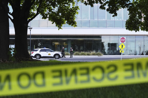 Law enforcement monitors the scene at Utah Valley University after Turning Point USA CEO and co-founder Charlie Kirk was shot and killed , Saturday, Sept. 13, 2025, in Orem, Utah. (AP Photo/Lindsey Wasson)