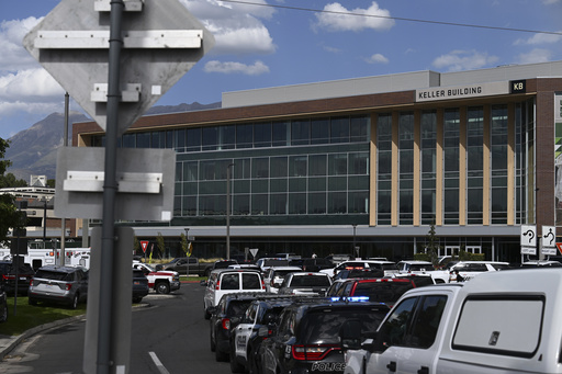 First responder vehicles are seen outside the Keller Building on the Utah Valley University campus Wednesday, Sept. 10, 2025, in Orem, Utah. (AP Photo/Tyler Tate)