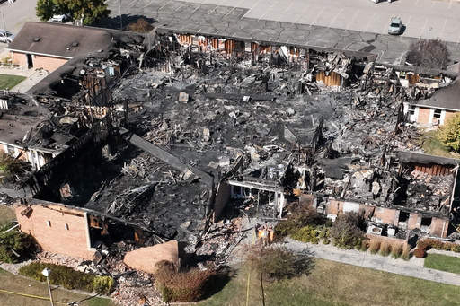 Little remained of The Church of Jesus Christ of Latter-day Saints chapel the day after a former Marine opened fire and set the building ablaze in Grand Blanc Township, Mich., Monday, Sept. 29, 2025. (AP Photo/Mark Vancleave)