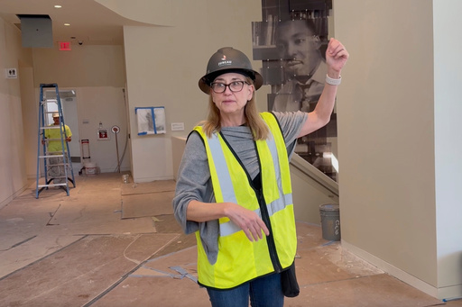 Jill Savitt, President and CEO of the National Center for Civil and Human Rights in Atlanta, leads a hard-hat tour of the expanded museum before its November reopening on Wednesday, Sept. 10, 2025. (AP Photo/Michael Warren)