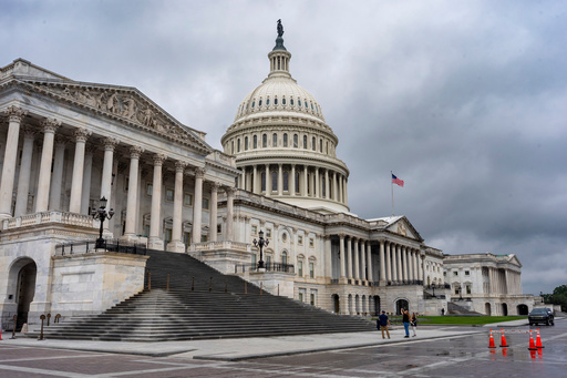 The Capitol is seen during rainy weather just days before federal money runs out which could trigger a government shutdown, in Washington, Thursday, Sept. 25, 2025. (AP Photo/J. Scott Applewhite)