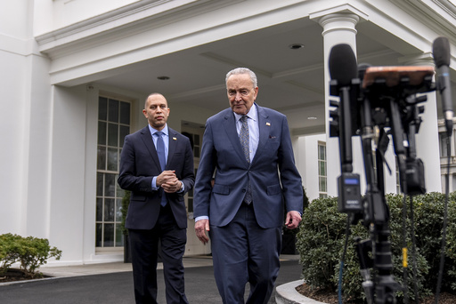 FILE—Sen. Chuck Schumer, D-N.Y., and Rep. Hakeem Jeffries, D-N.Y., left, arrive to speak to members of the media outside the West Wing at the White House in Washington, Tuesday, Feb. 27, 2024. (AP Photo/Andrew Harnik, file)