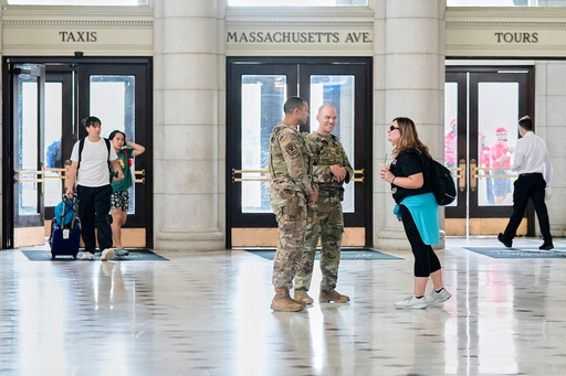 Members of the District of Columbia National Guard patrol Union Station, Tuesday, Sept. 2, 2025, in Washington. (AP Photo/Mariam Zuhaib)