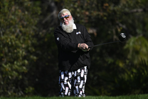 FILE - John Daly tees off on the second hole during the final round of the PNC Championship golf tournament, Sunday, Dec. 22, 2024, in Orlando, Fla. (AP Photo/Phelan M. Ebenhack, File)