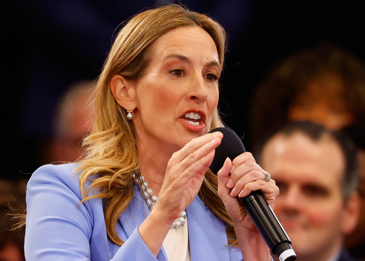 FILE - Democrat Mikie Sherrill responds to questions during the first general election gubernatorial debate with Republican opponent Jack Ciattarelli, Sept. 21, 2025, in Lawrenceville, N.J. (AP Photo/Noah K. Murray, File)