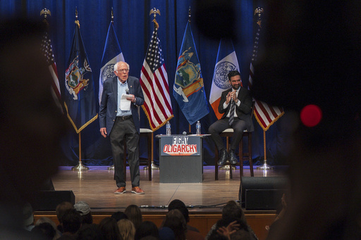 Sen. Bernie Sanders, I-Vt., left, and New York City mayoral candidate Zohran Mamdani speak during a town hall on Saturday, Sept. 6, 2025, in New York. (AP Photo/Olga Fedorova)